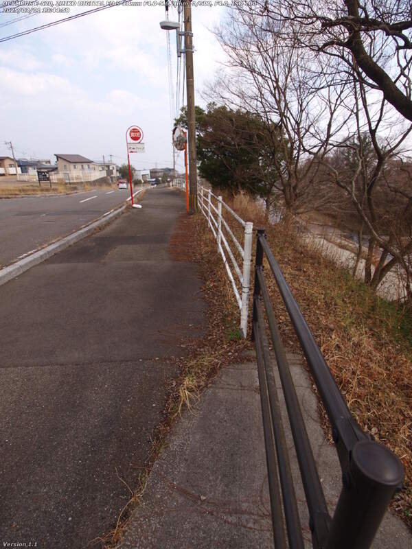 扇山町(別府市) 扇山町の道路を境川沿いに少し下る